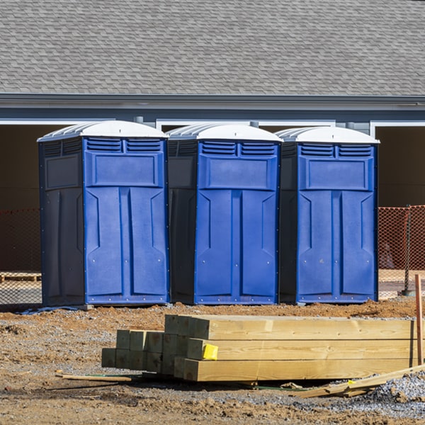 what is the cost difference between standard and deluxe porta potty rentals in Coles Point